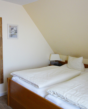 Unsere 4* Ferienwohnung Muschel bietet auf 60 m² Platz für bis zu 4 Personen. 